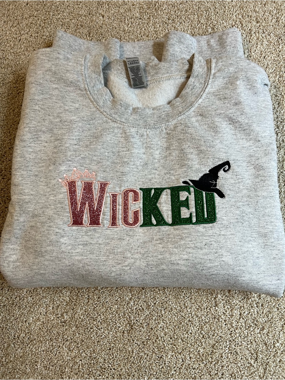 Pink and green embroidered wicked sweatshirt